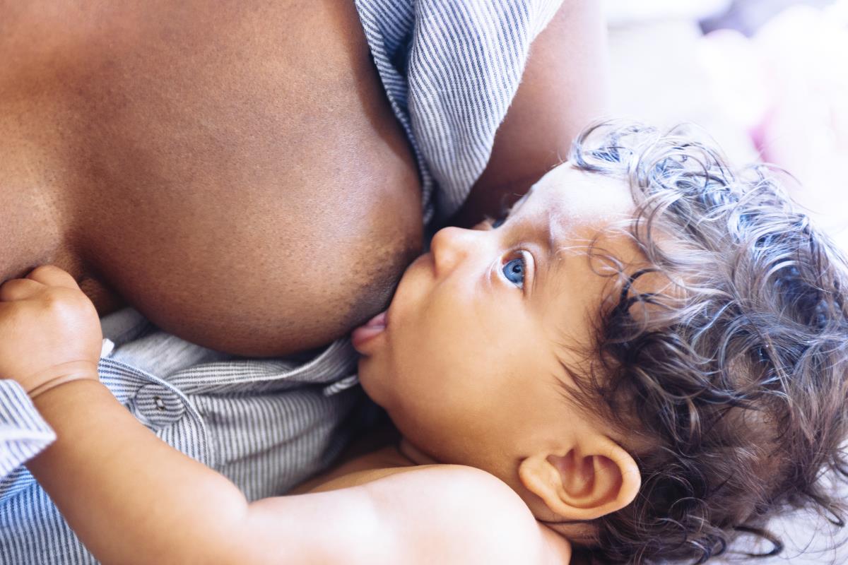 Woman-Breastfeeding-Baby-Infant-Milk.jpg