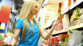 Woman-In-Supermarket-Buying-Food-Label-I