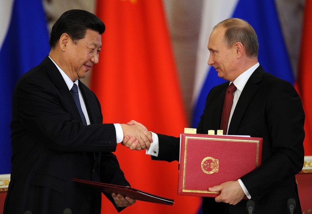 Image: Russia and China pledge friendship, denounce the West