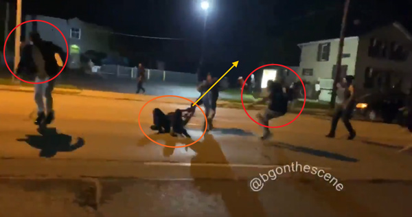 FIGHT for your LIFE: Stunning video shows moment armed
security man had to shoot multiple rioters from the ground or be
beaten to death by Black Lives Matter thugs 4