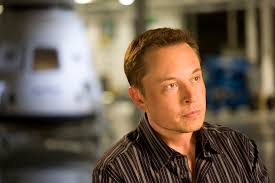 Image: Elon Musk pushing carbon tax con that will pad his own pockets with billions