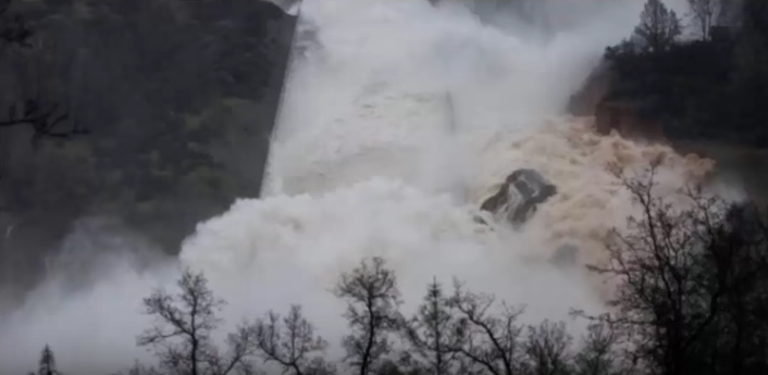 Image: Government THEATER on parade in California as helicopters drop useless bags of rocks onto failing Oroville dam for the TV cameras