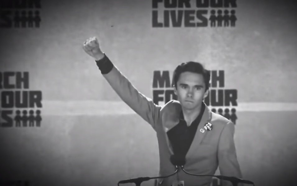 Image: Hypocrite David Hogg marches in protest against NRA alongside his own personal armed guards – watch at Brighteon.com