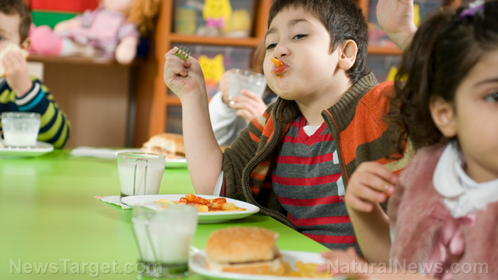 Image: School food makes kids fat: Expert finds U.S. schools are feeding low-income children like pigs at the trough