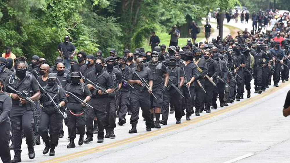 Image: Militant black NFAC militia threatens to kidnap police officers and hold them for ransom