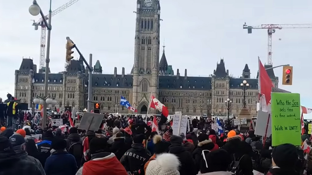 Image: Canadian PM Trudeau invokes emergency powers, claims anyone donating money to Freedom Convoy truckers is engaged in “terrorist financing”