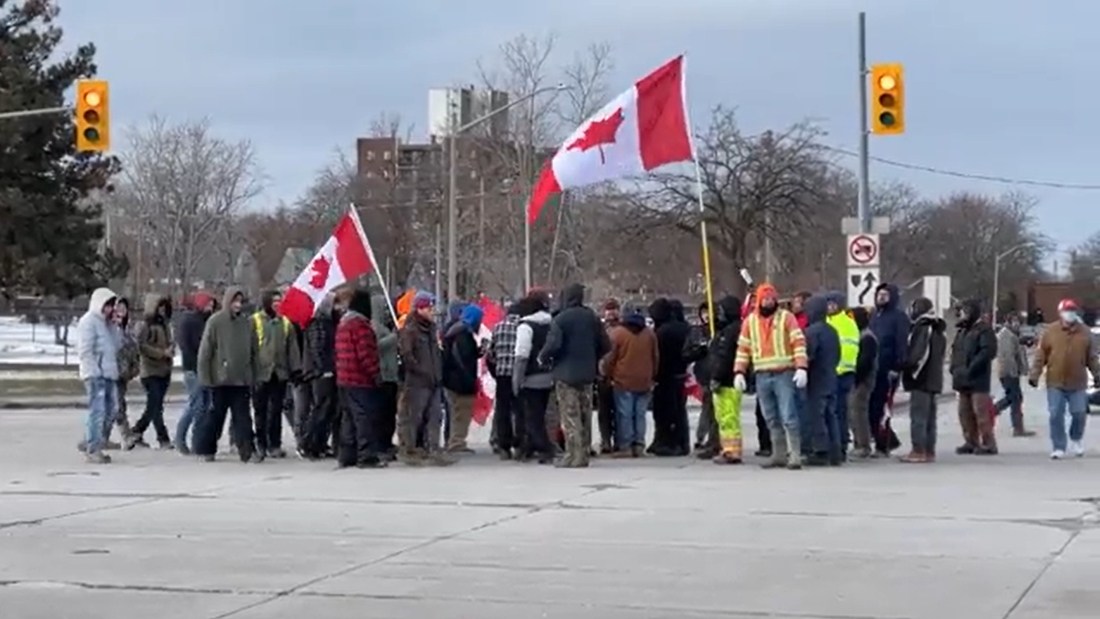 Image: Canadian authorities move in to clear Freedom Convoy truckers off bridge, Trudeau’s govt. deploys snipers