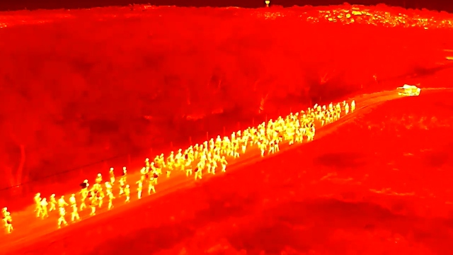 Image: Infrared camera catches small army of migrants illegally entering U.S. as Republicans consider impeaching DHS chief