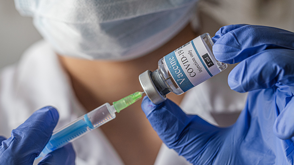 Image: Japan orders probe of COVID-19 vaccine deaths