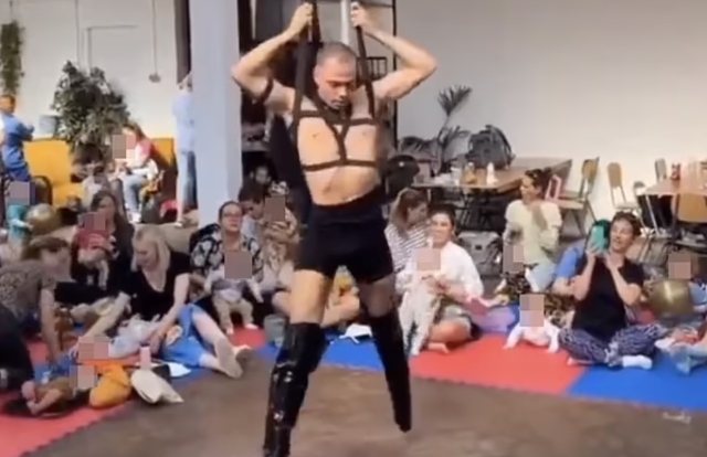 Image: WOKE CULT INSANITY: Half-naked man performs bondage routine in front of babies and parents, stoking outrage