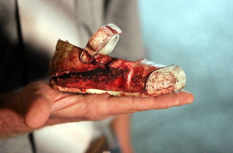 Bloody Childs Shoe After Rocket Fired From Gaza Hit Israel